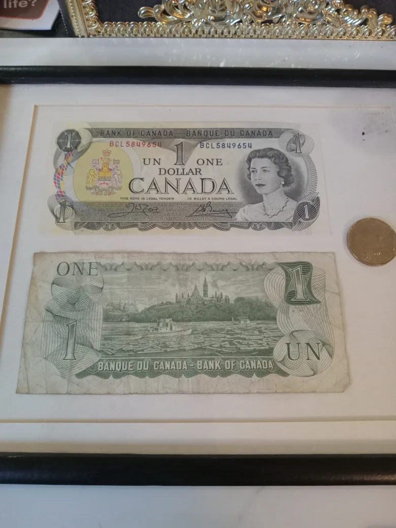 Framed Canadian One Dollar Bills & Coin image indicator(2)