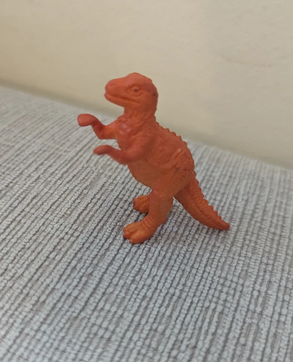 Orange Dinosaur Toy Figure thumbnail