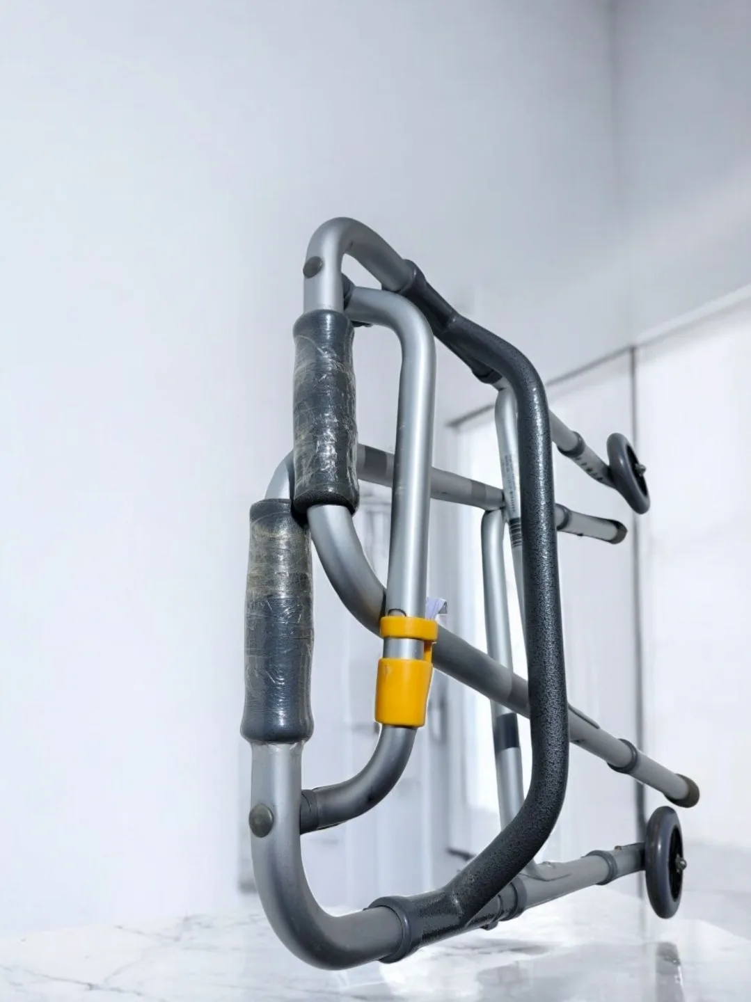 Deluxe Two Button Folding Walker with 5" Wheels image indicator(7)