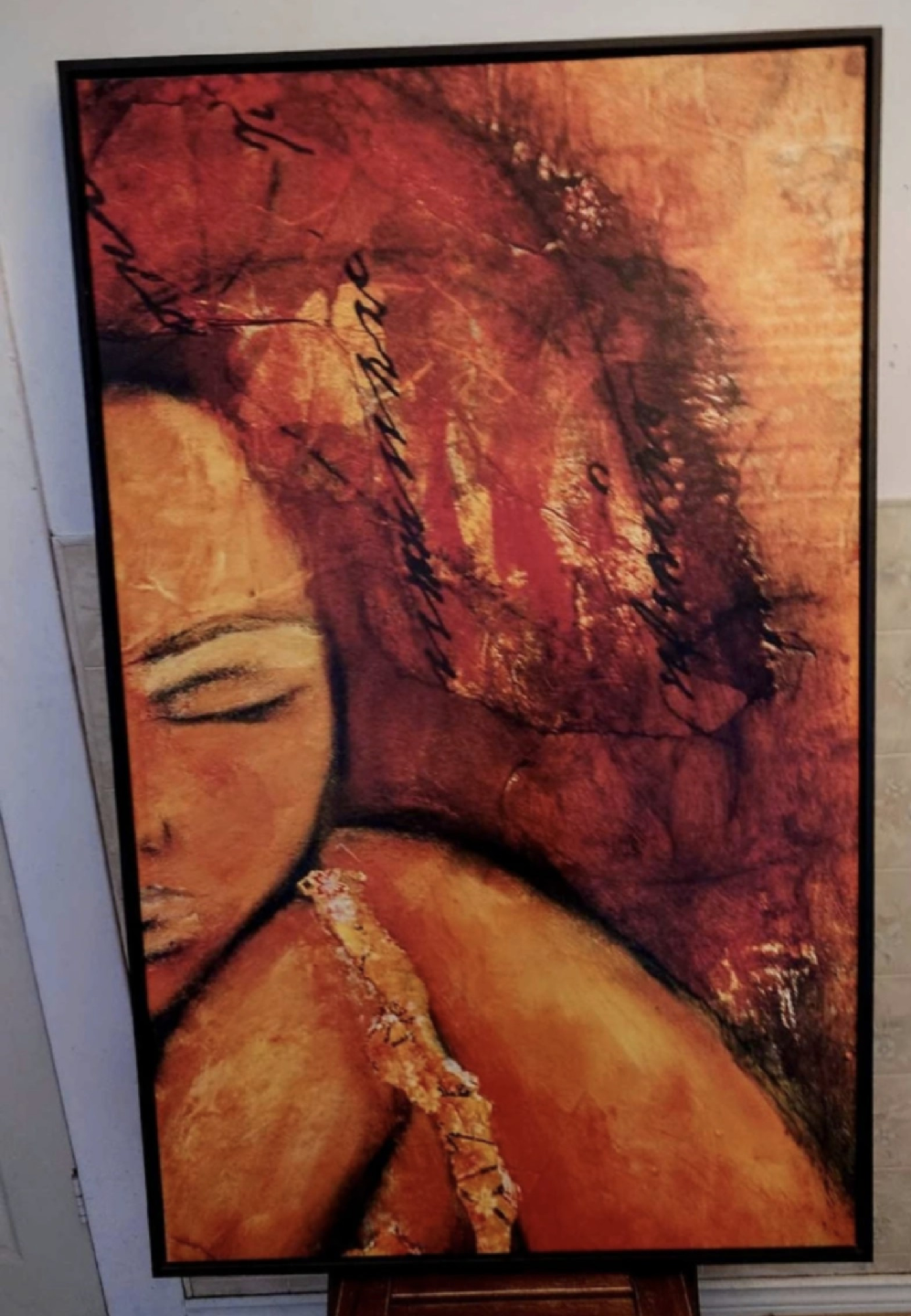 Portrait of an African girl. Framed print on canvas.
