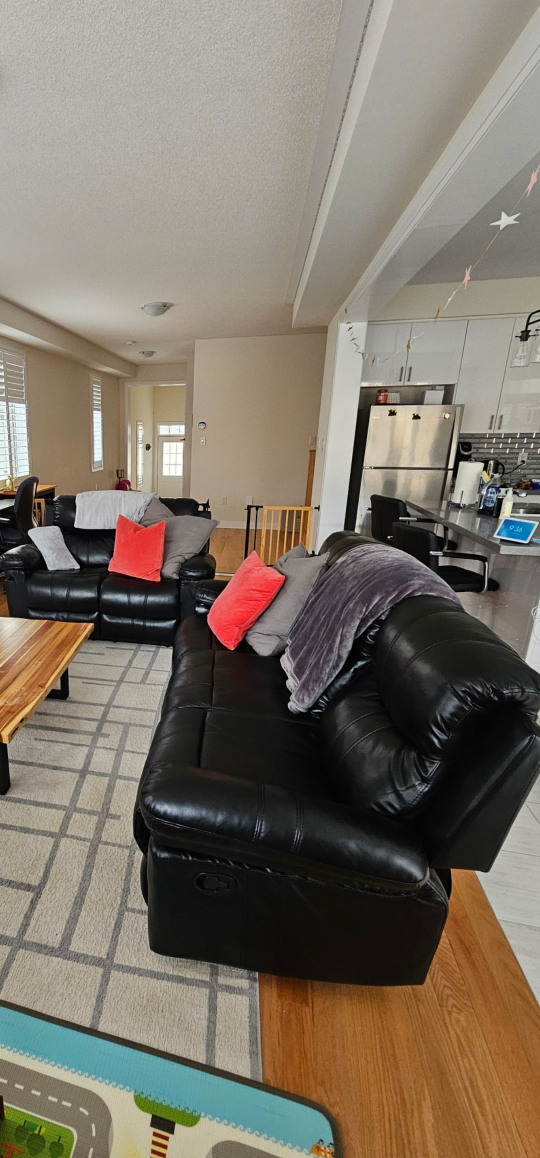 Black Leather Reclining Sofa and Loveseat Set