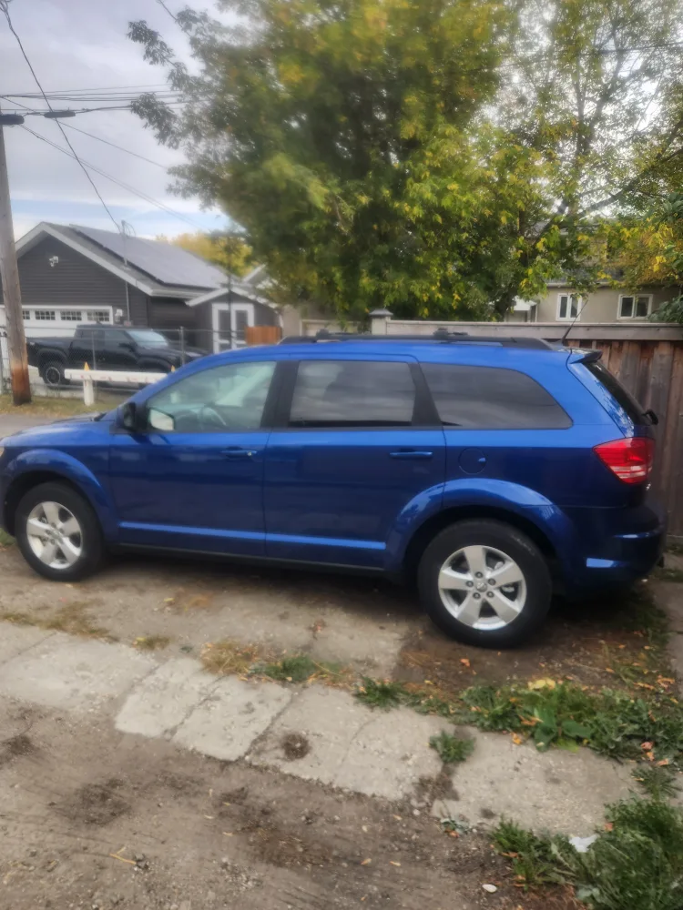 2010 Blue Dodge Journey SUV