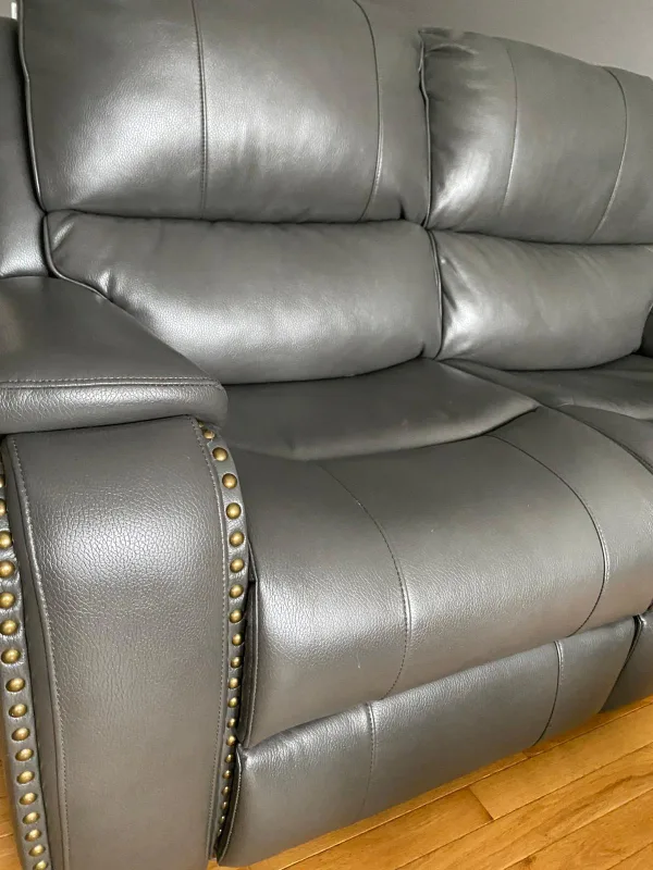 Grey Leather Reclining Sofa with Nailhead Trim image indicator(5)