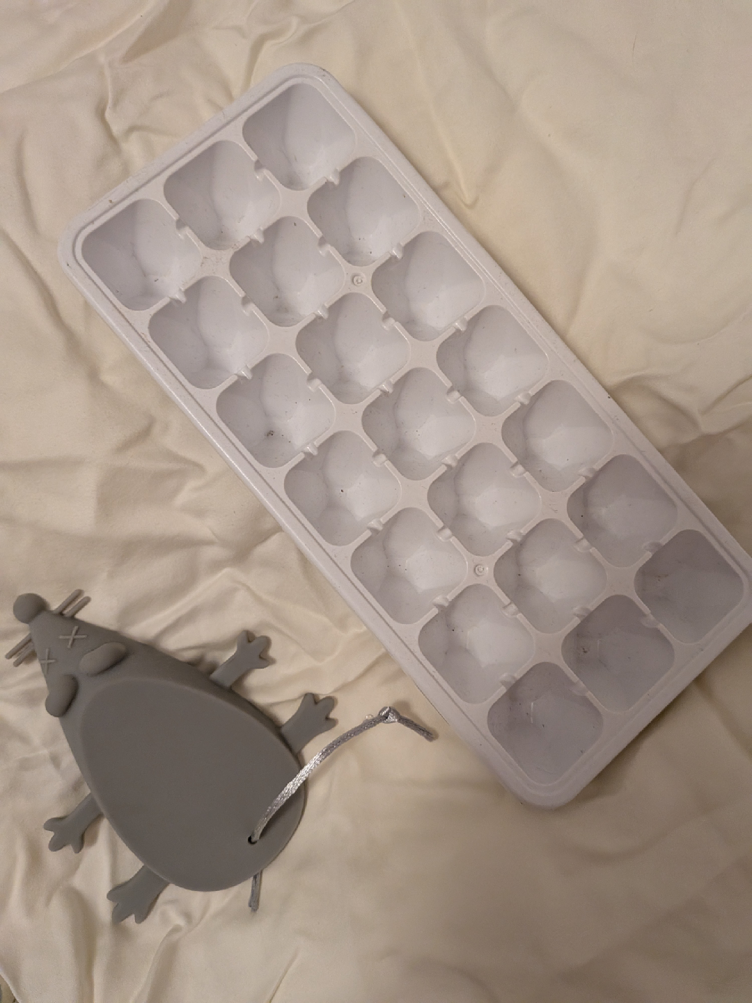 Ice cube tray and mouse door stopper, pillow case