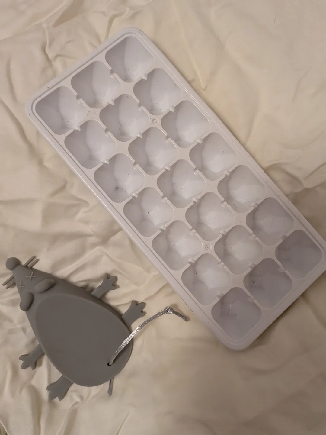 Ice cube tray and mouse door stopper, pillow case thumbnail