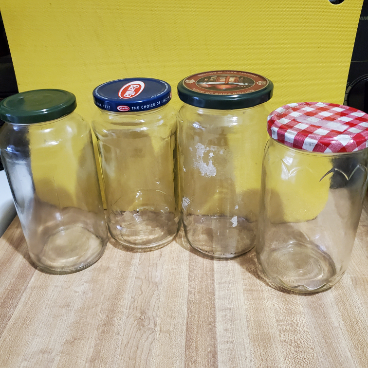 4 tall Glass Jars 🥕