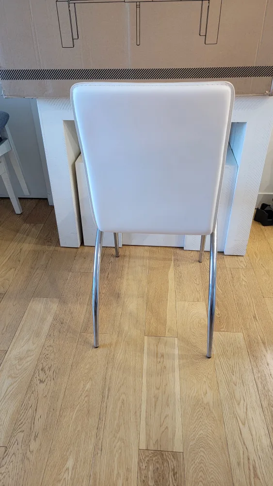 4 White Dining Chairs with Gray Covers image indicator(8)