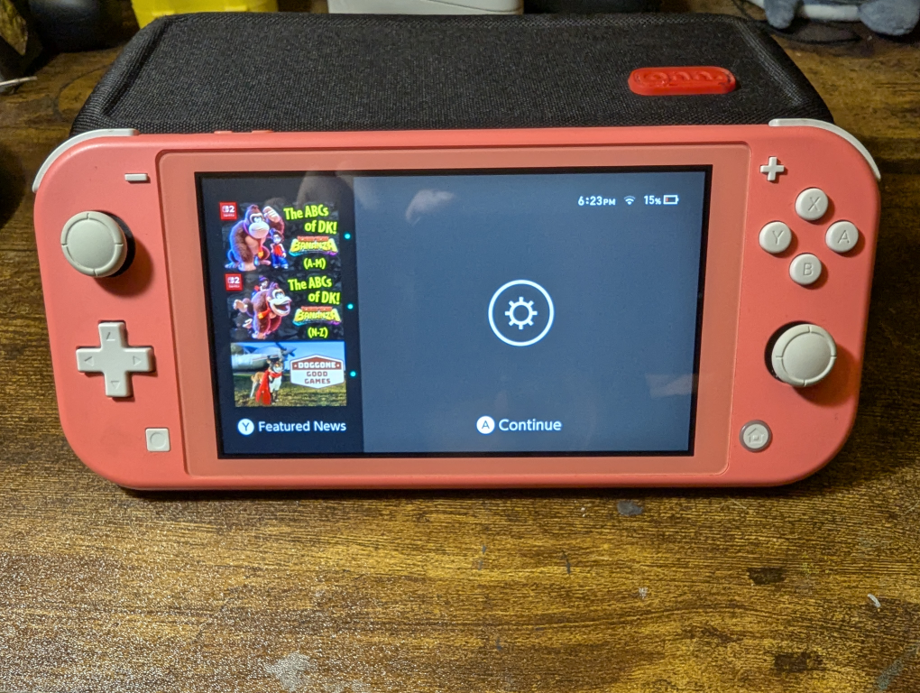 Nintendo Switch Lite Coral Pink with Case