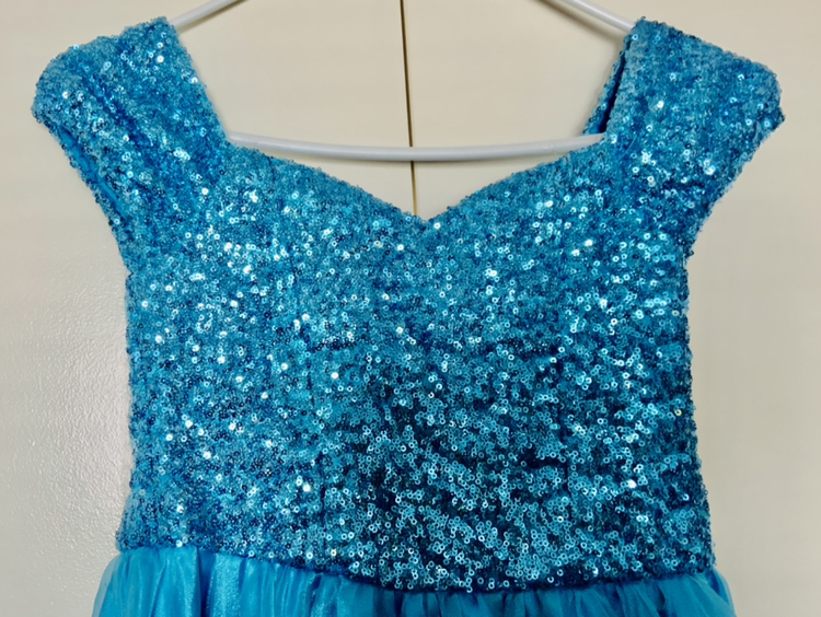 Kids gown blue sparkles and ruffles design on the bottom