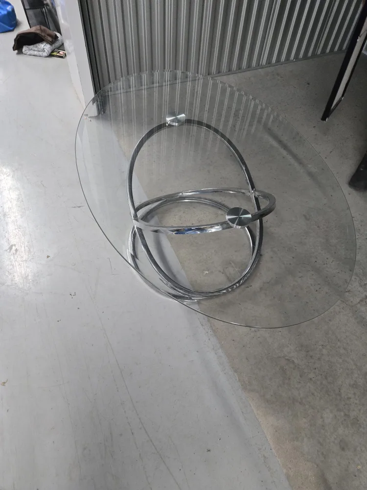 Glass Oval Coffee Table with Chrome Base image indicator(2)