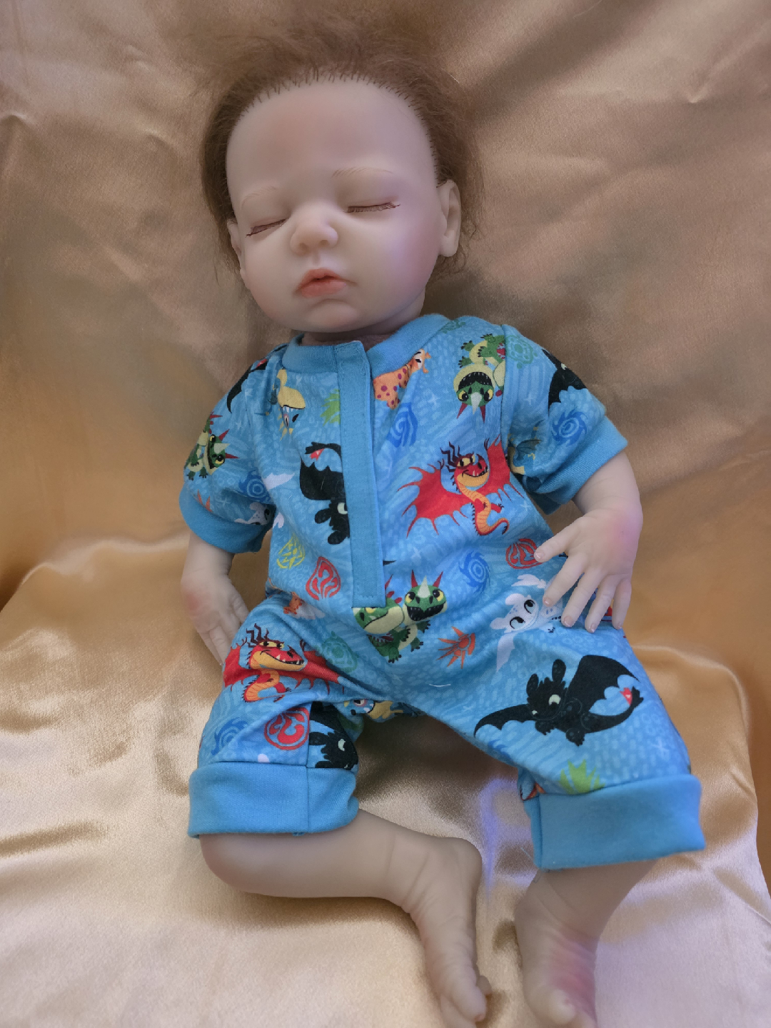 Doll in White Snowsuit