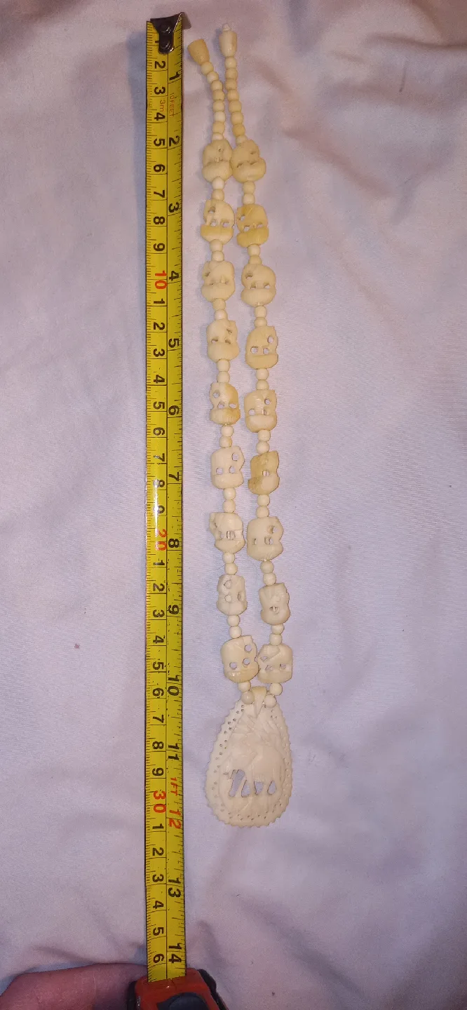 Vintage Elephant Bone Necklace with detailed chain pieces image indicator(6)