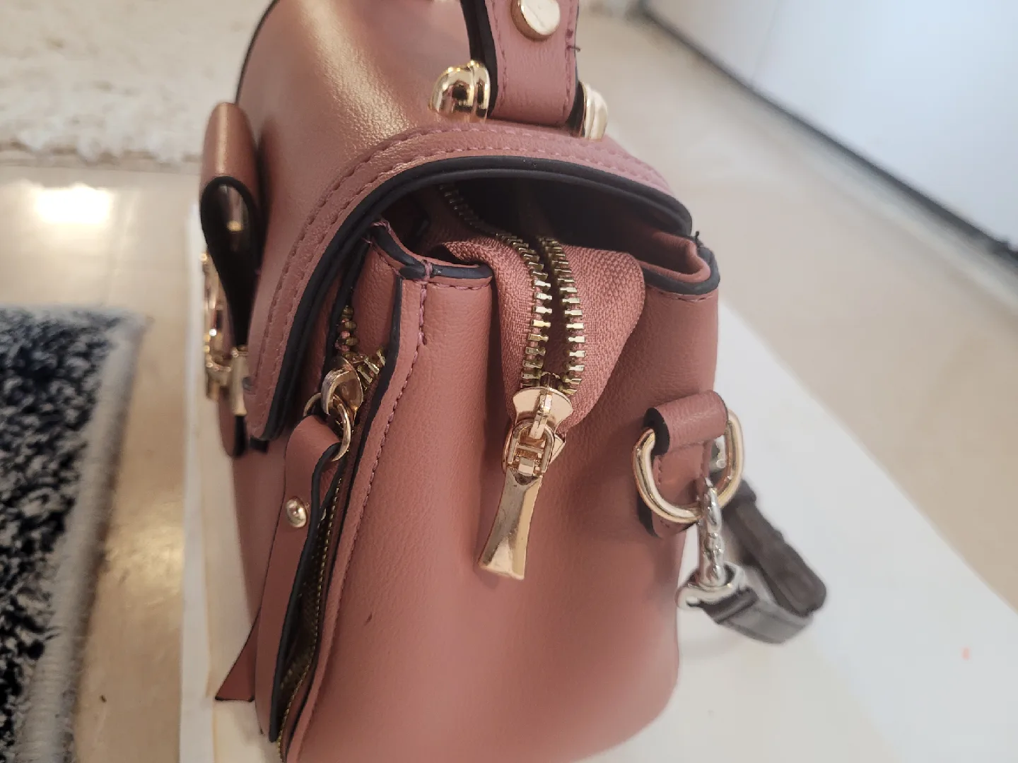 Brown Handbag with Gold Accents image indicator(2)