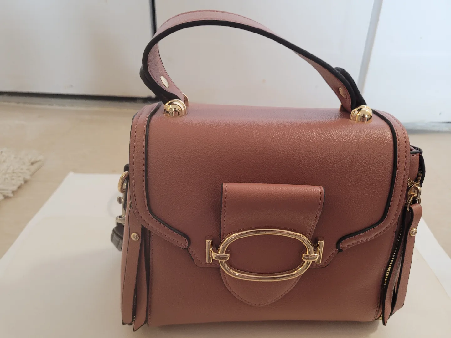 Brown Handbag with Gold Accents image indicator(4)