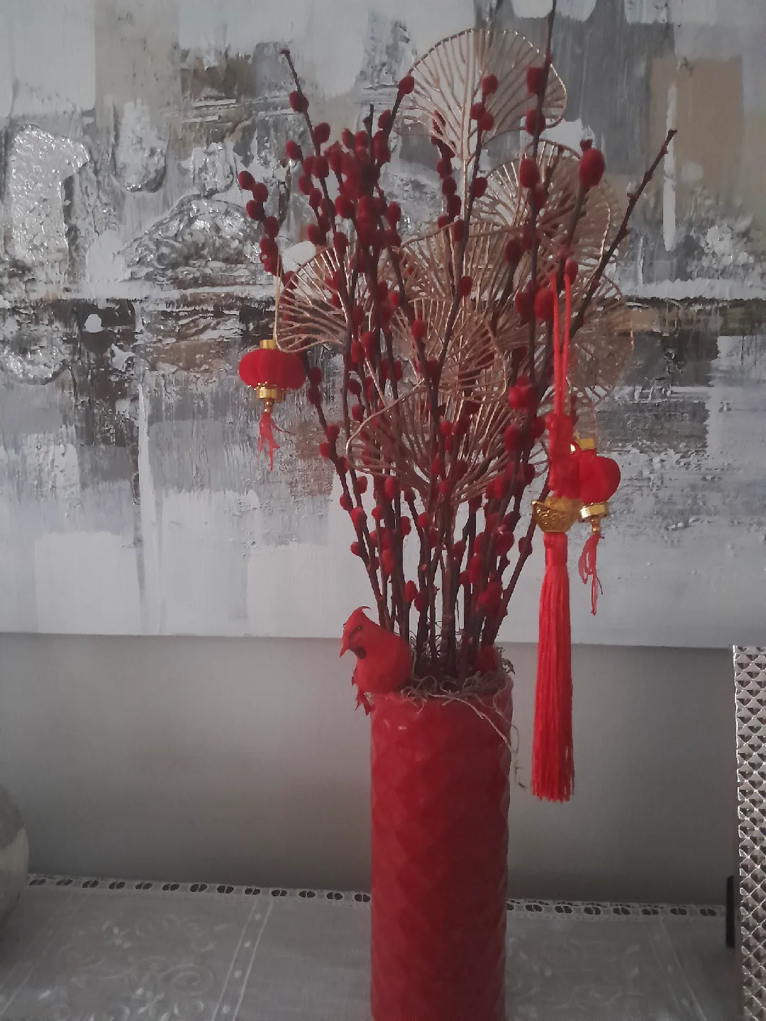Red Decorative Vase with Floral Arrangement thumbnail