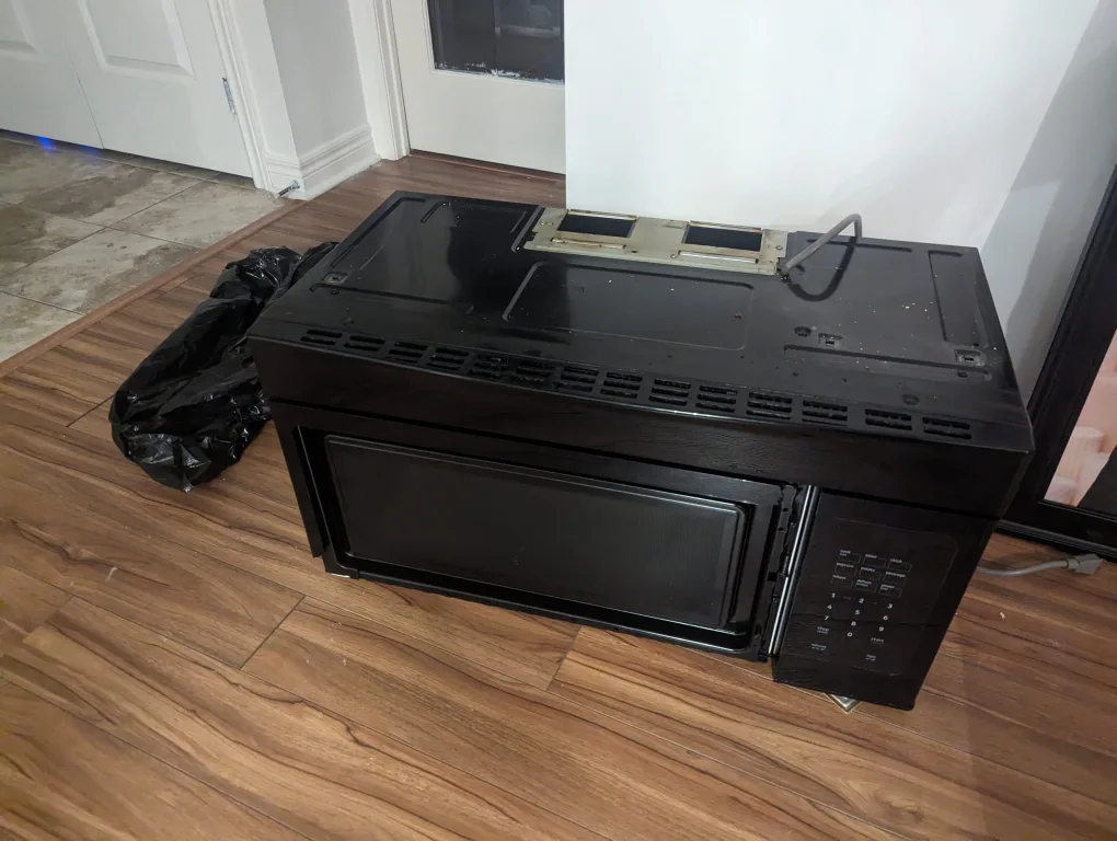 Black Over-the-Range Microwave image indicator(4)