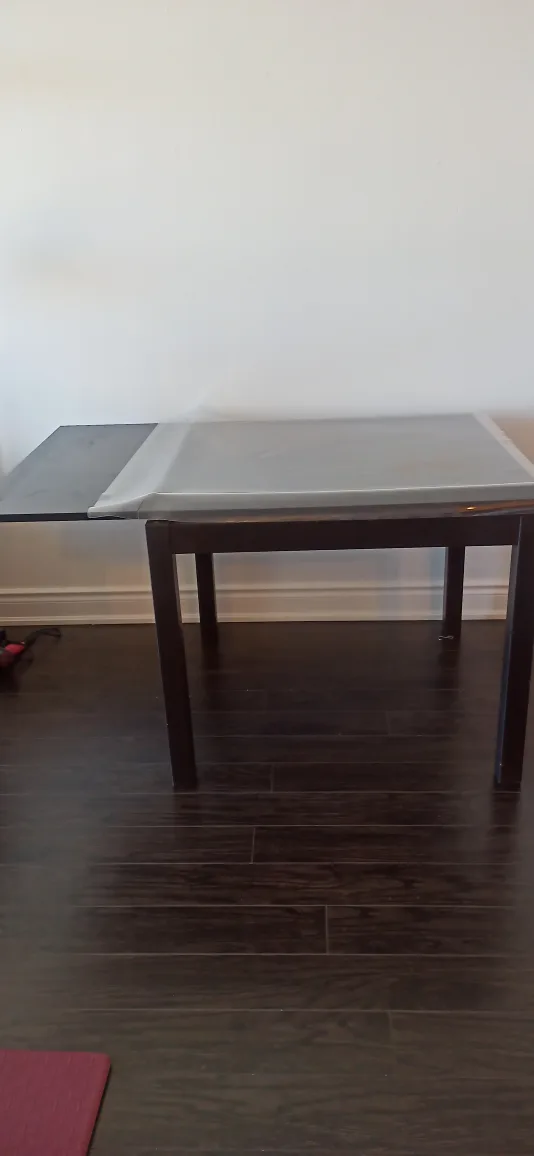 Expandable black Dining Table image indicator(4)