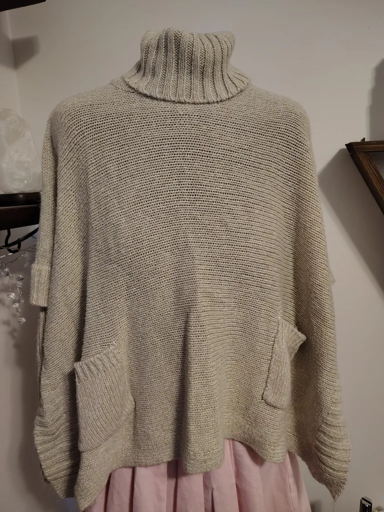 Beige Knit Turtleneck Poncho with Pockets image indicator(2)
