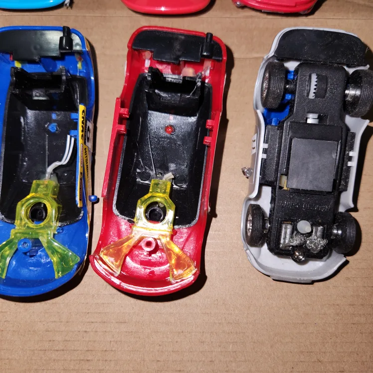 Lot of 10 Toy Artin slot Racing Cars image indicator(8)