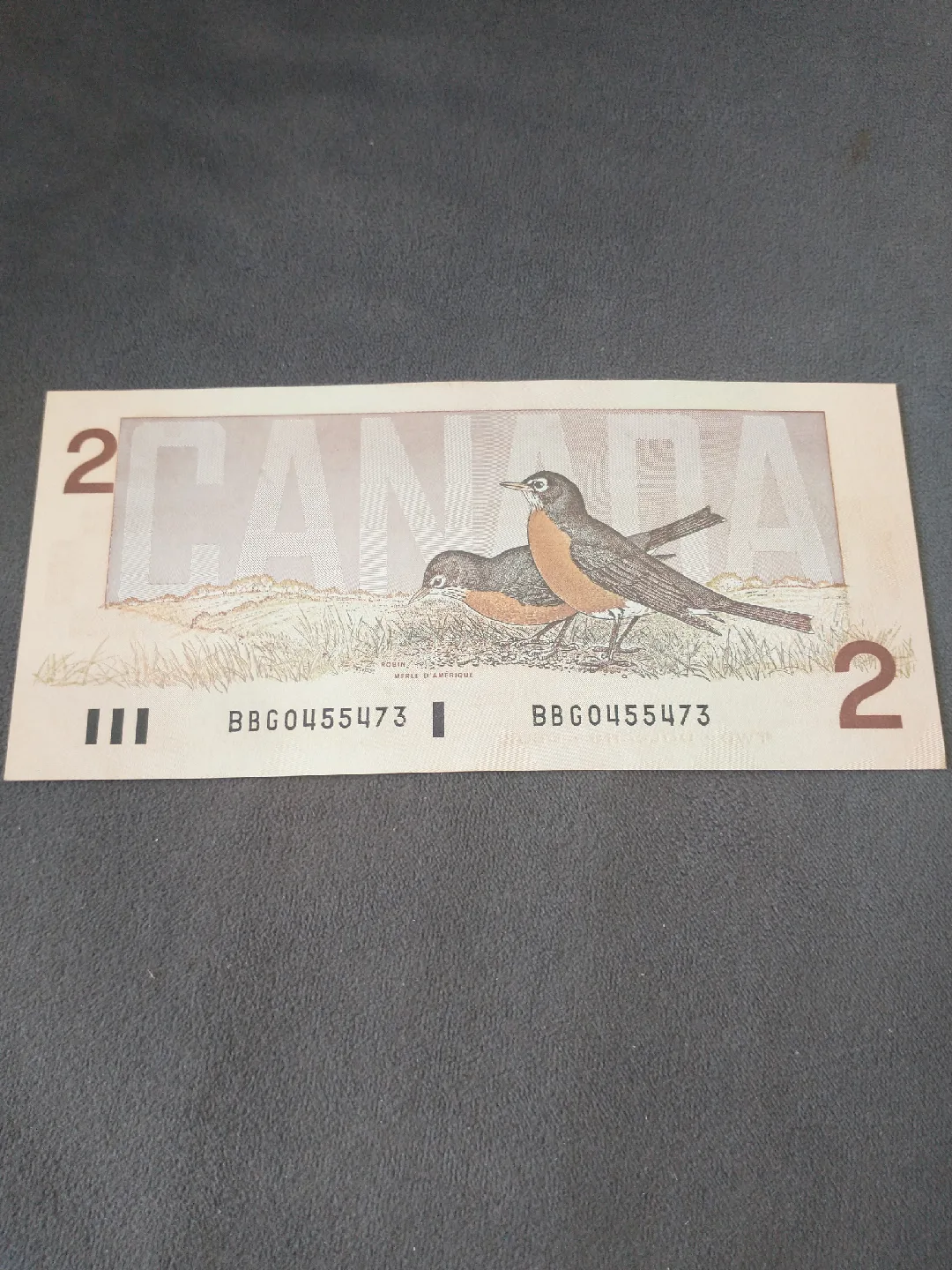 Crisp 1986 Canada GGT/JWC uncirc. $2 banknote serial 5473 image indicator(2)