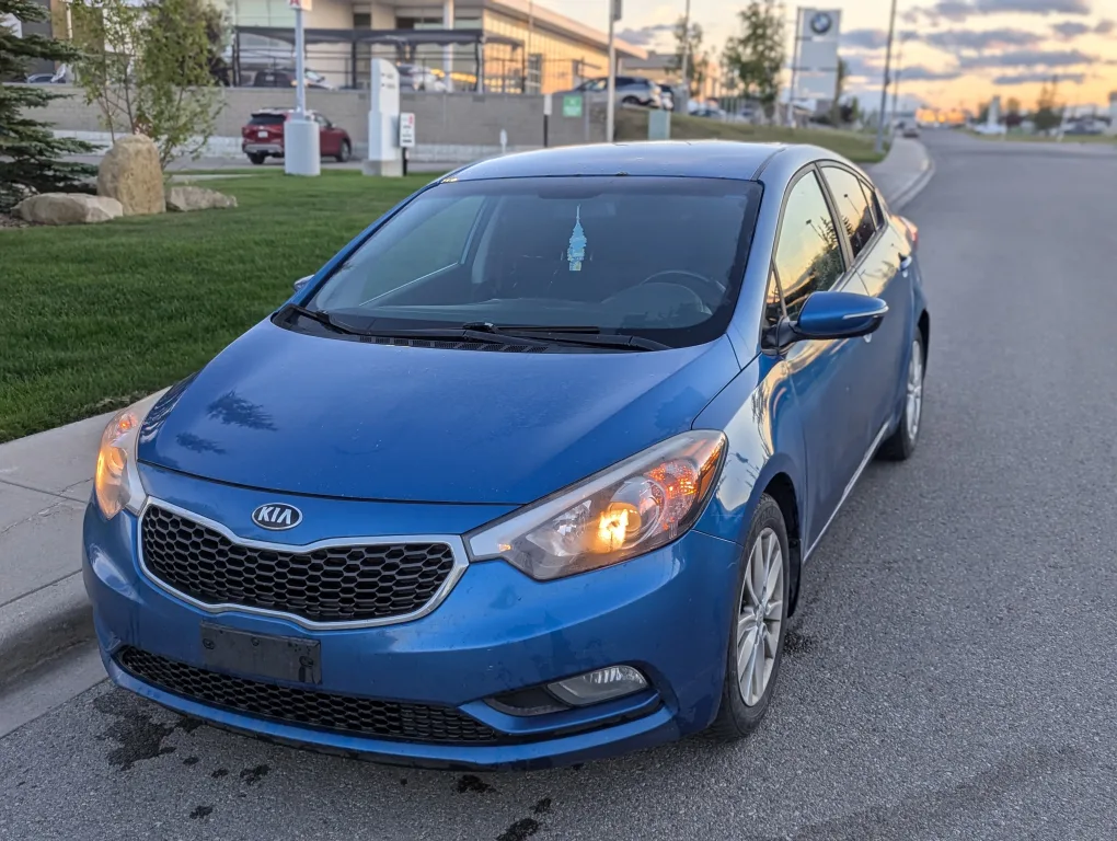 2015 Blue Kia Forte image indicator(2)