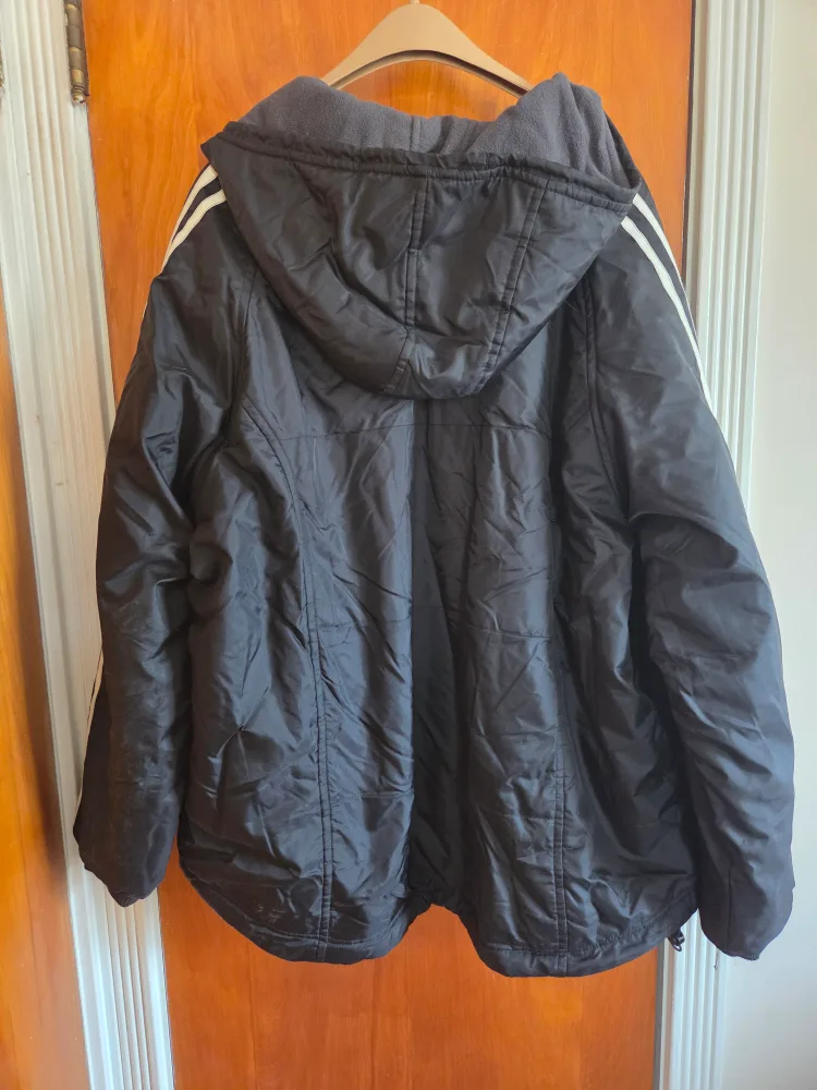 Black hooded jacket with white stripes image indicator(4)