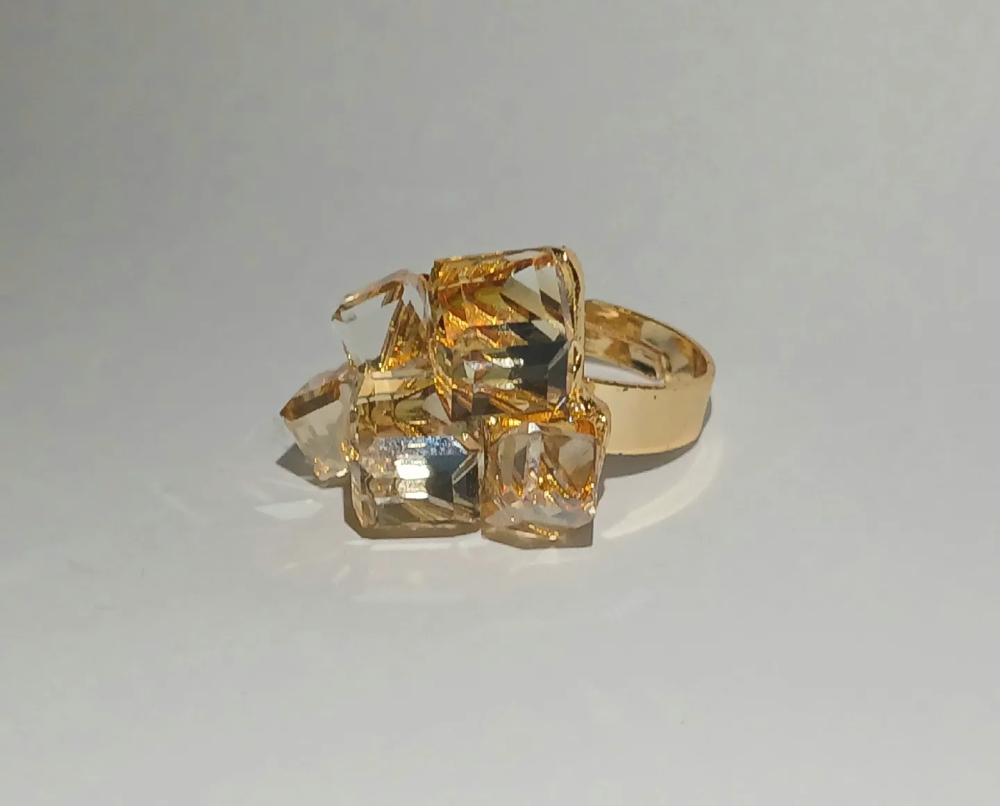 Gold Tone Ring with golden Coloured gems thumbnail