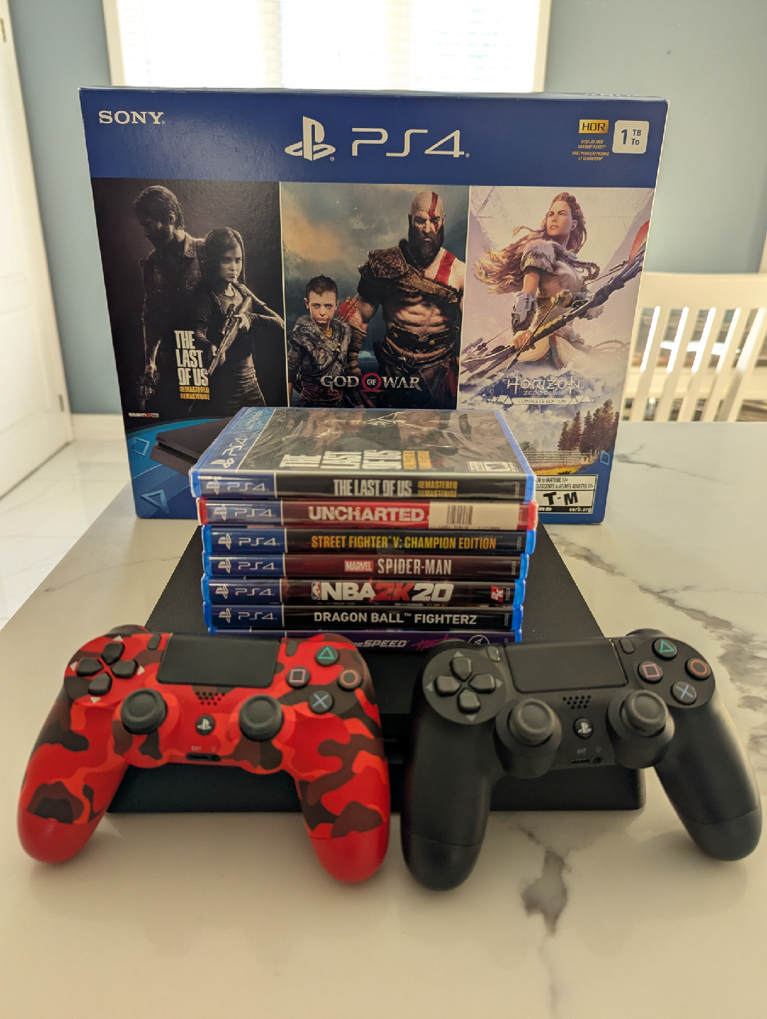 Sony PS4 Slim 1TB Console with Games & Controllers