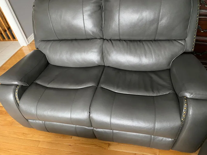 Grey Leather Reclining Sofa with Nailhead Trim image indicator(4)