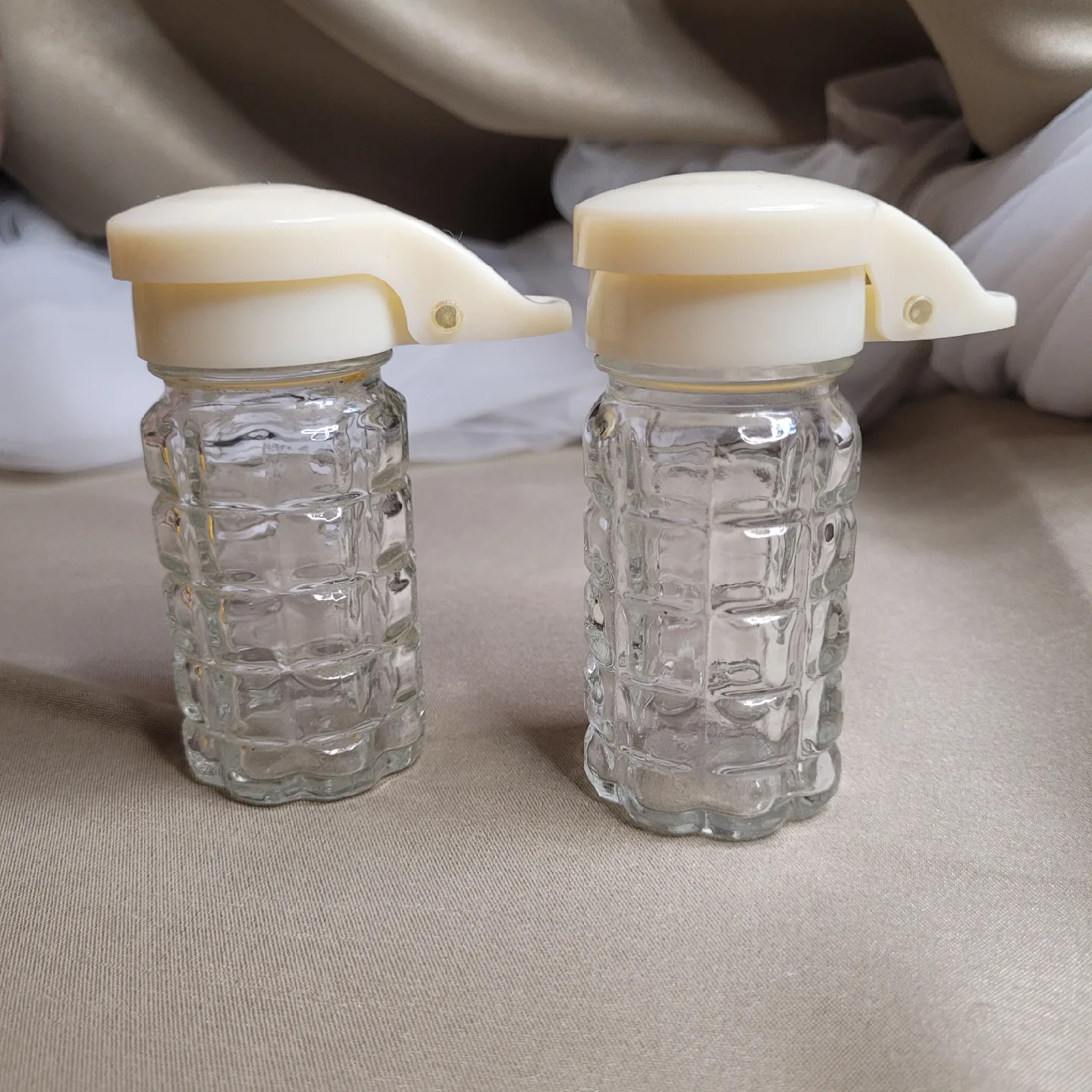 Pair of Glass Vintage Salt & Pepper Shakers with Plastic Tops thumbnail