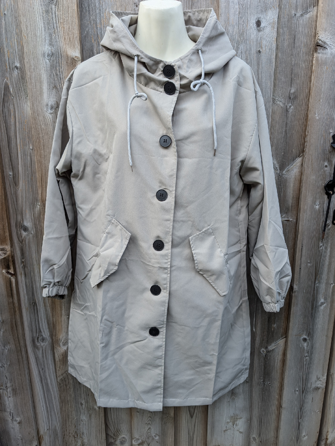 Beige Hooded Rain Coat New, not worn sml/med