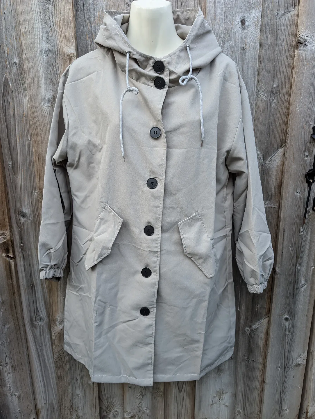 Beige Hooded Rain Coat New, not worn sml/med thumbnail
