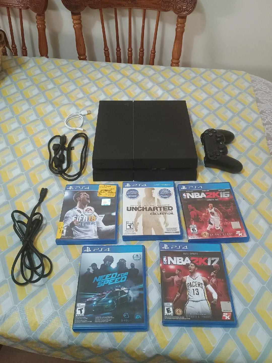 PlayStation 4 + Original Controller + 5 Popular Games thumbnail