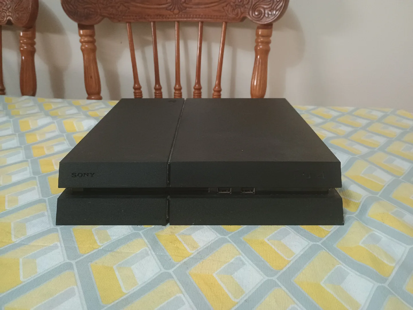 PlayStation 4 + Original Controller + 5 Popular Games image indicator(6)