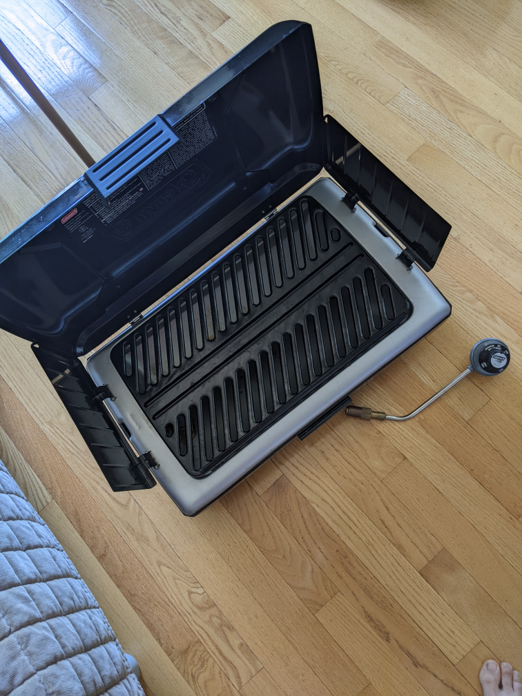 Coleman Camp Grill - Portable BBQ + Grill Stand