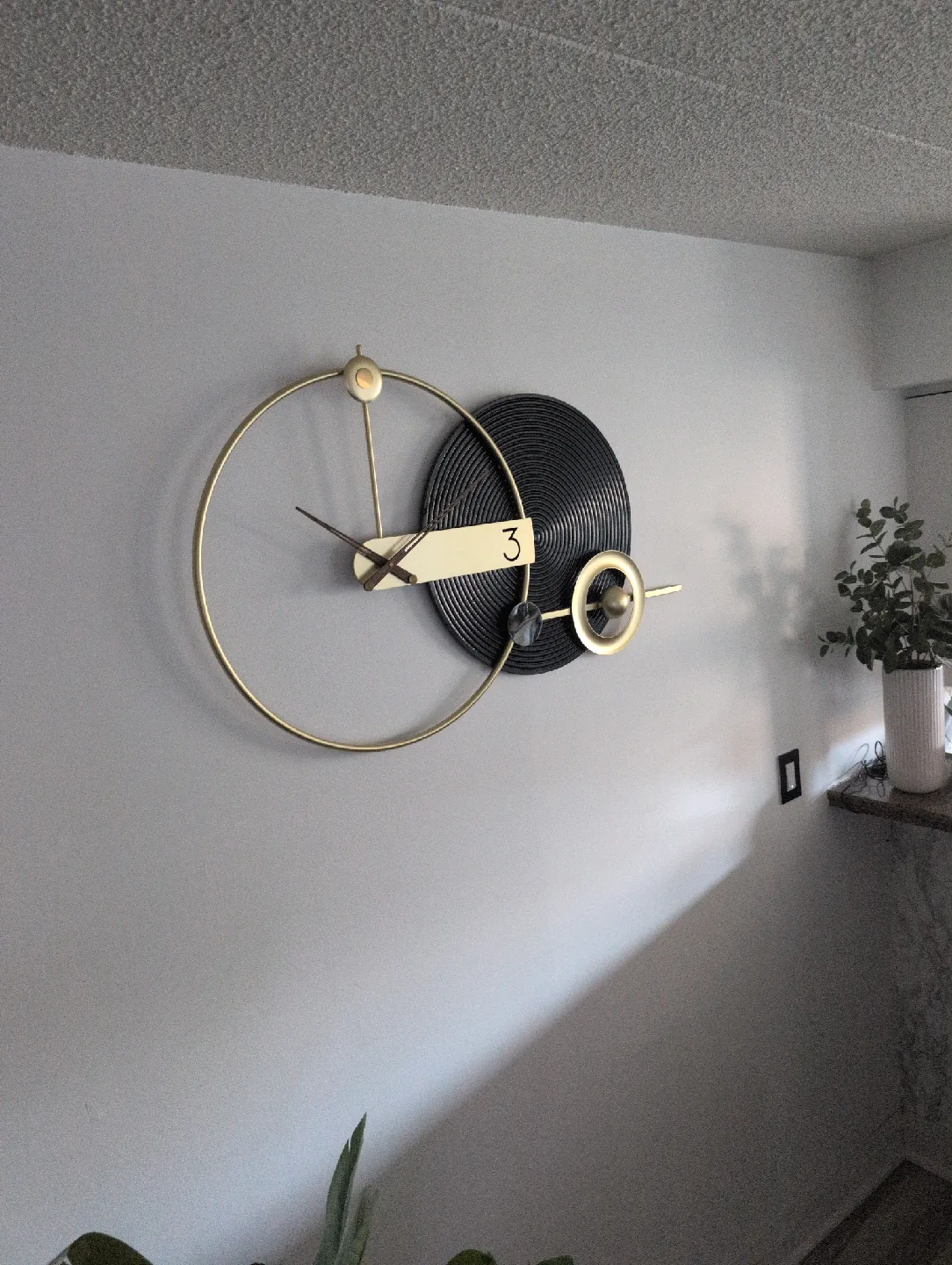 Modern Wall Clock - Gold and Black Accent Piece image indicator(2)