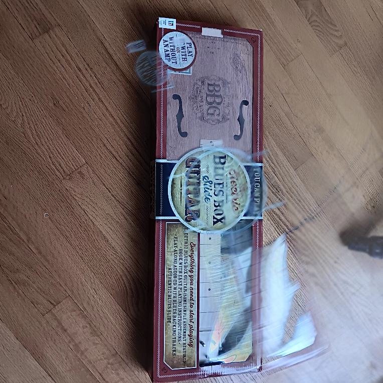 The Electric Blues Box Slide Guitar