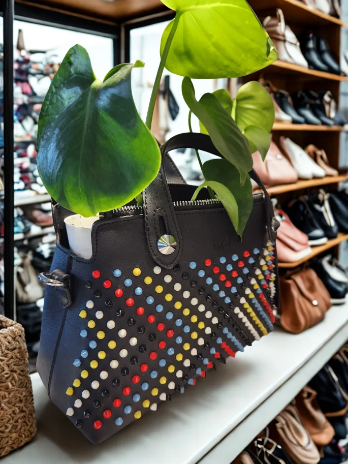 i Black Leather Studded Bag planter with monstera plants thumbnail
