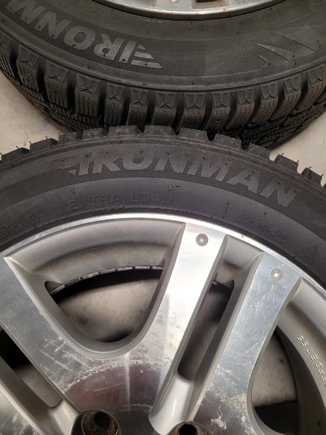 A set of Honda Winter tires with alloy rims for sale image indicator(2)