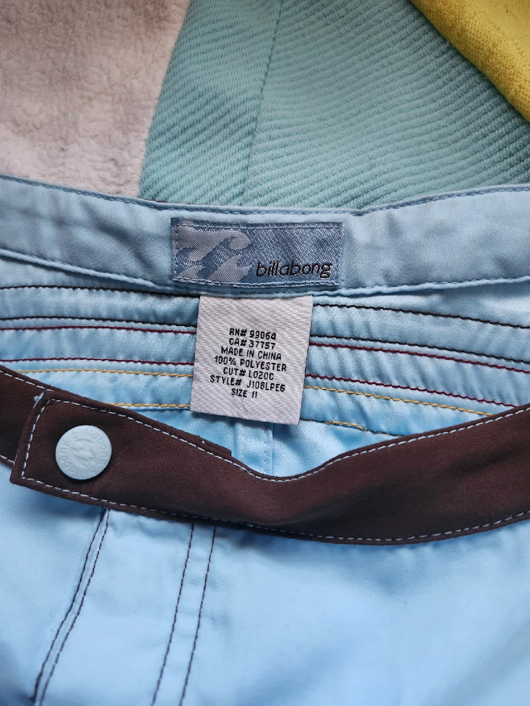 blue and brown billabong board shorts image indicator(4)