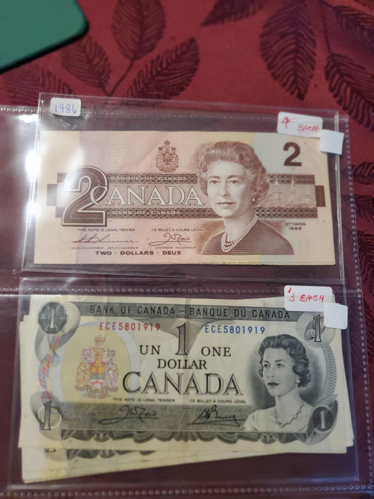 Canadian 1 and 2 dollar bills