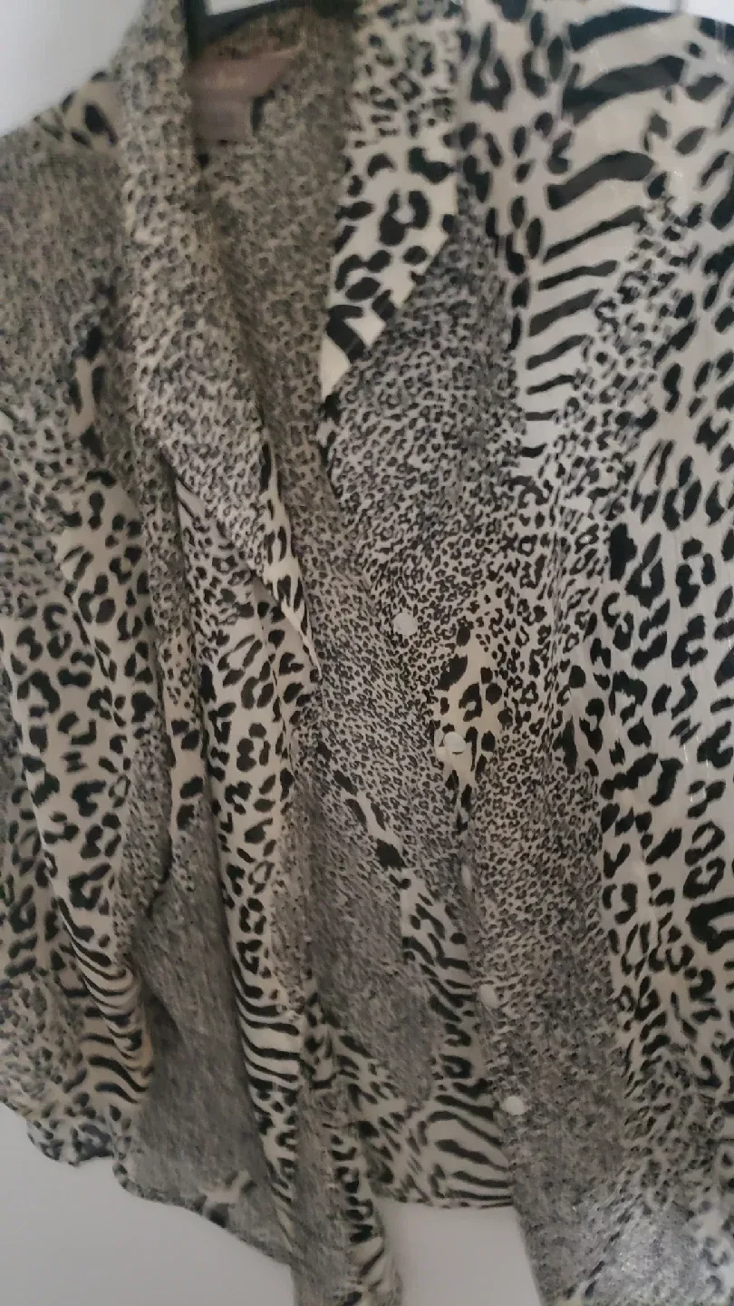 sheer animal print long sleeve blouse image indicator(2)