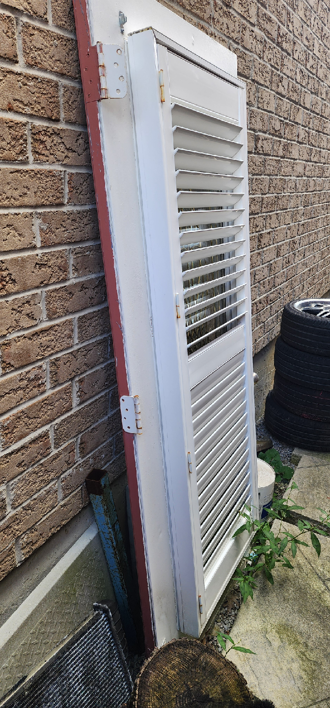 White Louvered Door with Glass Insert