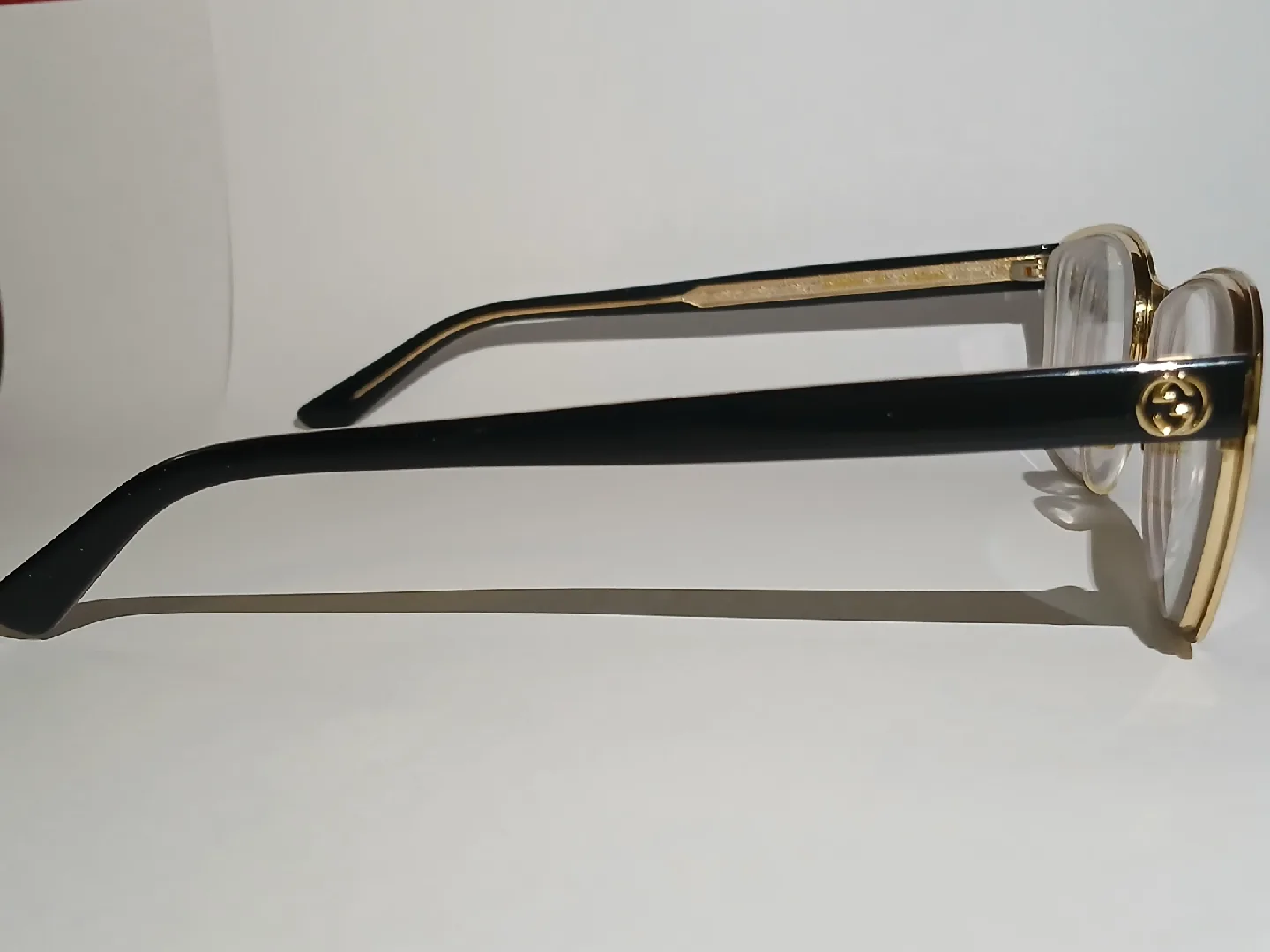 Gucci glasses Gold and Black Frame image indicator(2)