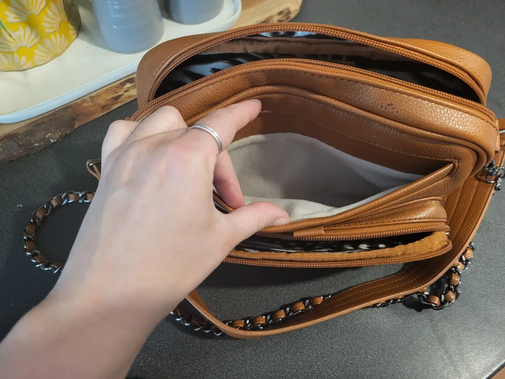 Lug Carrousel Crossbody Bag with Chain Strap image indicator(5)