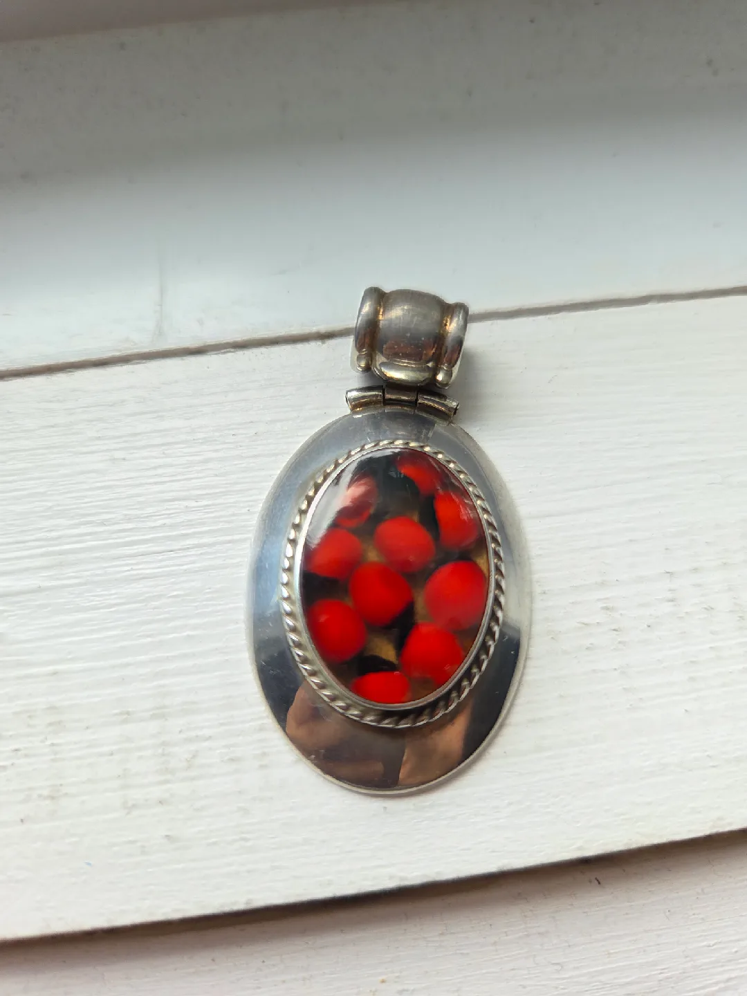 Silver Pendant with Red Huyruro Seeds thumbnail
