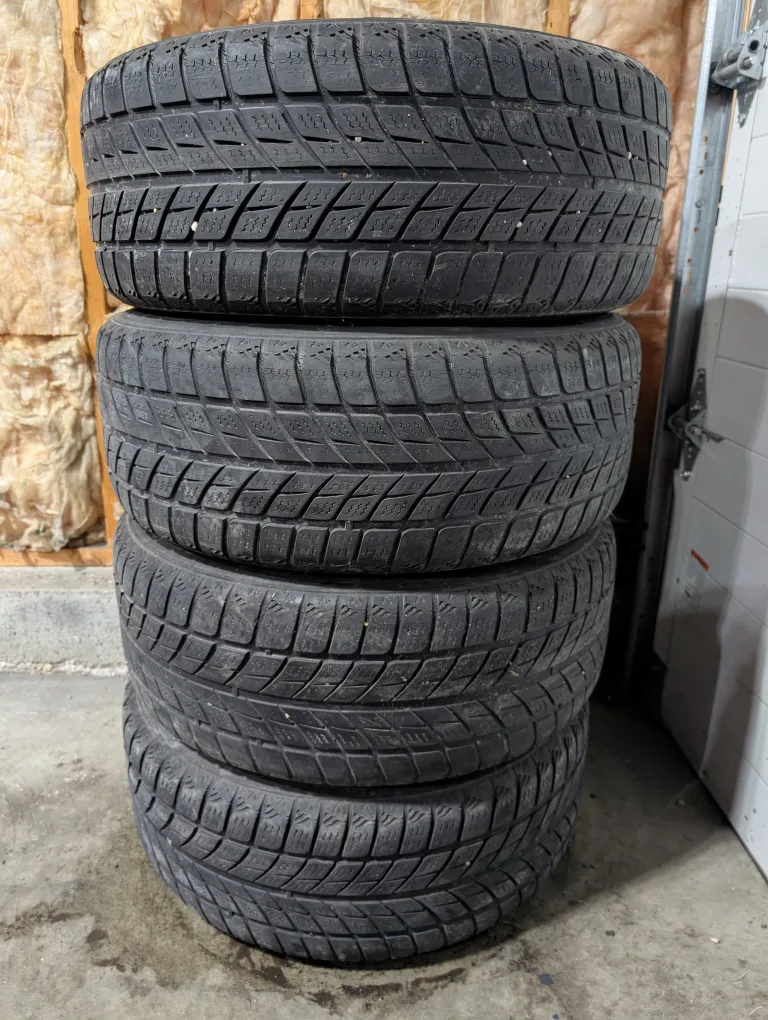 (4)-235/55R17 Winter Tires On Steel Rims Off 2013 Ford Escape thumbnail