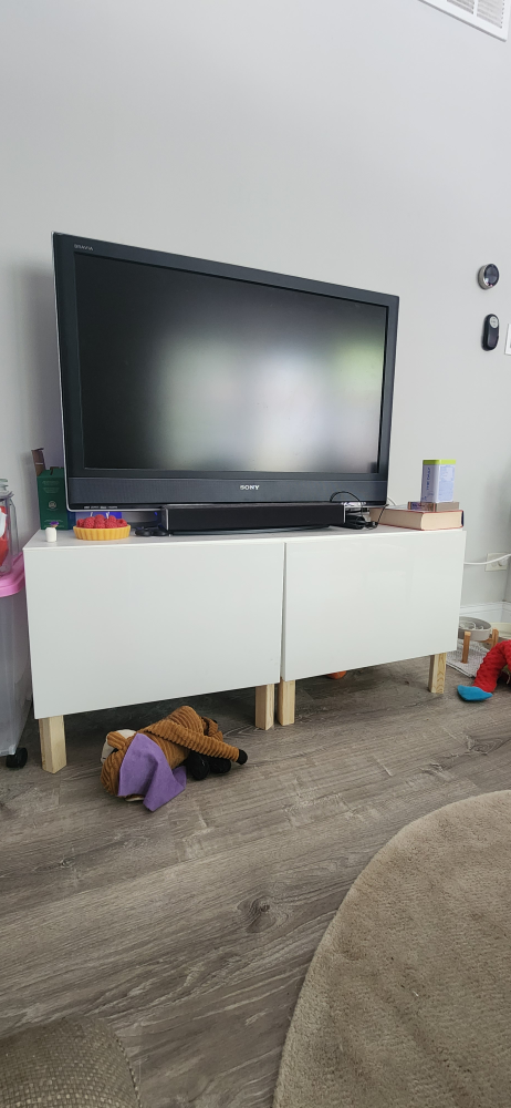Two IKEA BESTA cabinets