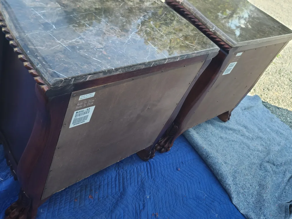 PAIR OF ASHLEY FURNITURE CARVED NIGHTSTANDS WITH MARBLE TOP image indicator(4)