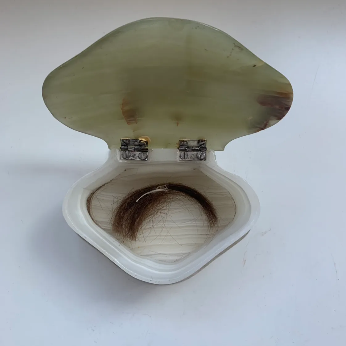 Vintage hinged lid trinket box with hair inside image indicator(2)